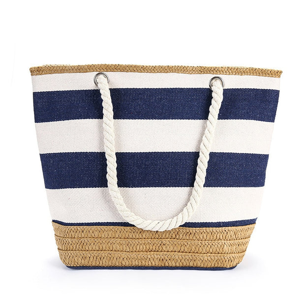 Striped canvas handbag, featuring a stylish and durable design. Perfect for adding a casual yet chic touch to any outfit, with ample space for your essentials.