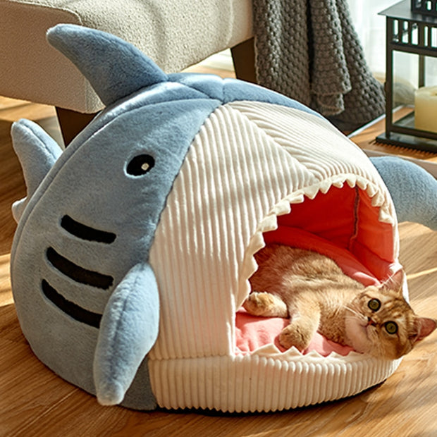 "Cozy Enclosed Cat Bed: A snug retreat for your feline friend, providing warmth and security for restful cat naps."