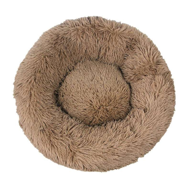 "Anti-Anxiety Calming Dog Bed: Provide comfort and relief to your furry friend with this soothing retreat designed to ease anxiety."