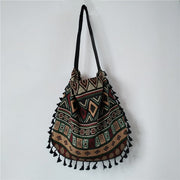 "Bohemian shoulder bag: Embrace free-spirited style with this eclectic accessory. Perfect for adding a touch of wanderlust charm to any outfit."