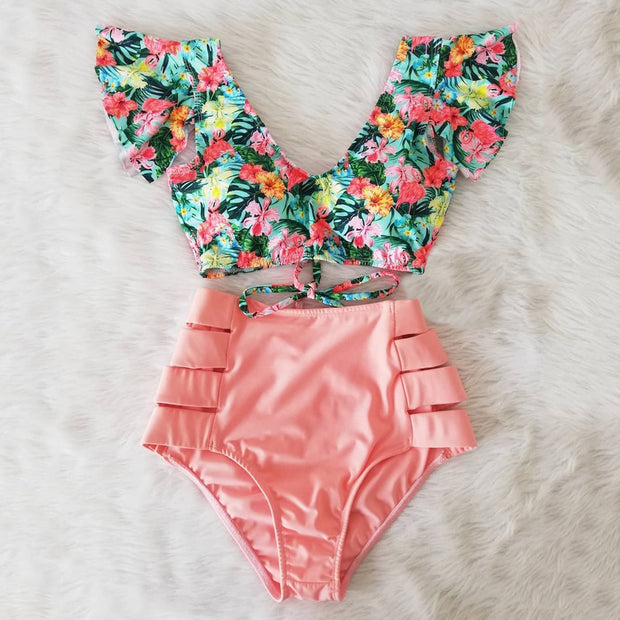 Sexy floral bikini set - a sultry and stylish two-piece ensemble featuring a bikini top and bottom adorned with vibrant floral patterns, perfect for a seductive beach look.