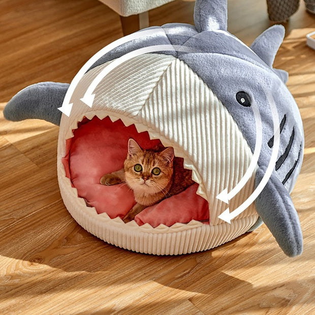 "Cozy Enclosed Cat Bed: A snug retreat for your feline friend, providing warmth and security for restful cat naps."