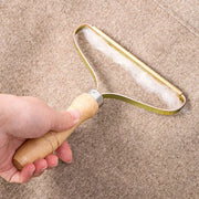 "Pet Hair Remover Brush: Effortlessly remove pet hair from furniture and clothing for a clean, fur-free environment."