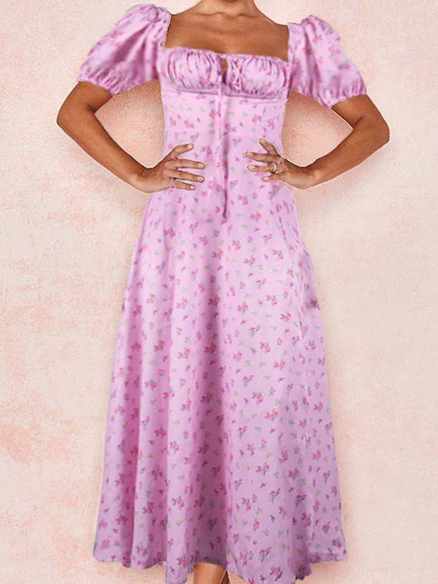 Floral print long dress, perfect for a romantic and feminine look. Features a flowing silhouette and vibrant floral pattern, ideal for summer weddings, garden parties, or special occasions.