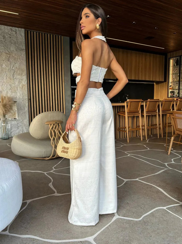 White backless sleeveless jumpsuit - a stunning and elegant one-piece outfit with a backless design, perfect for chic and sophisticated looks.