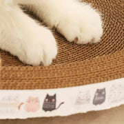 The Round Oval Corrugated Cat Scratcher is a durable and eco-friendly scratching solution for your feline friend. Made from sturdy corrugated cardboard, this scratcher provides an ideal surface for cats to sharpen their claws and stretch. Its round oval shape offers stability and versatility, allowing your cat to scratch comfortably from various angles.