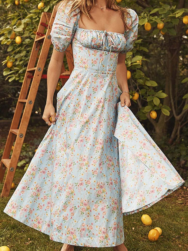 Floral print long dress, perfect for a romantic and feminine look. Features a flowing silhouette and vibrant floral pattern, ideal for summer weddings, garden parties, or special occasions.