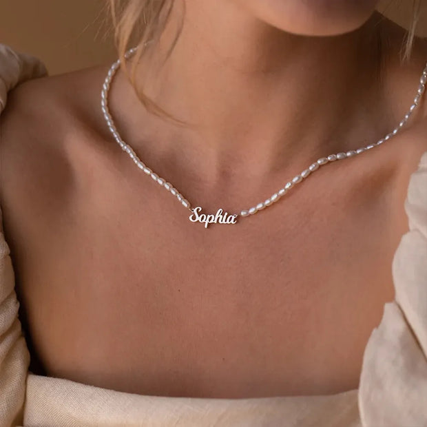 Personalized Name Pearl Chain: Elegant necklace with custom name pendant and lustrous pearl chain. Make a statement with this bespoke accessory.