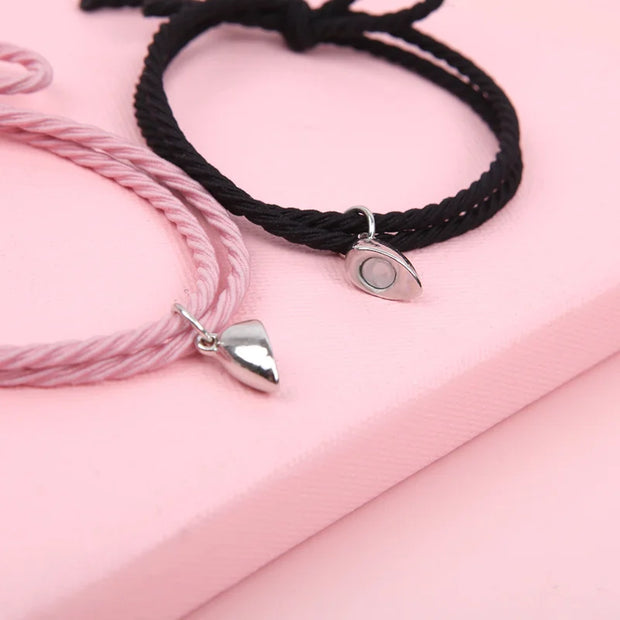 Magnetic heart couple bracelets featuring interlocking heart charms with magnetic clasps, designed for couples. Made from high-quality materials, these bracelets symbolize love and connection, perfect for daily wear.
