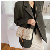 Quilted Ivory Crossbody Bag with Gold Tassel Accent - Sara closet