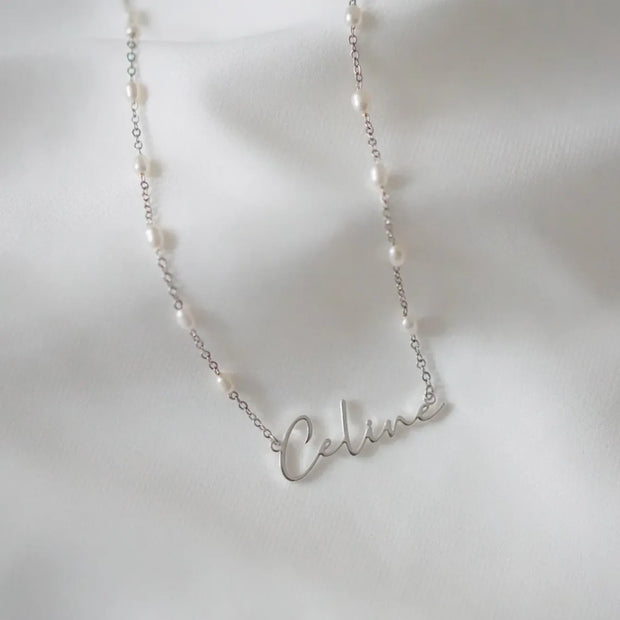 Custom Beaded Pearls Name Necklace: Unique jewelry featuring personalized name pendant on a delicate beaded pearl chain. Elevate your style.