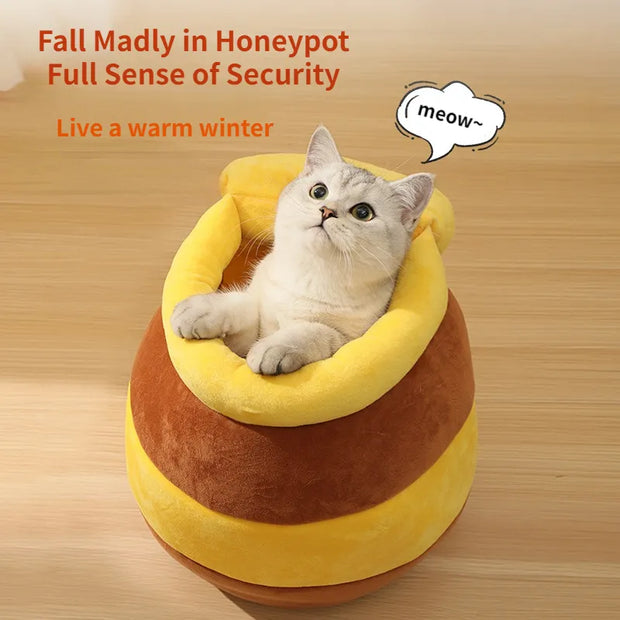 "Cozy honey jar cat bed, perfect for feline comfort and relaxation. Ideal for cat naps and lounging sessions."