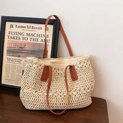 "Bohemian straw bag: Embrace laid-back style with this charming accessory. Perfect for sunny days and eclectic outfits."