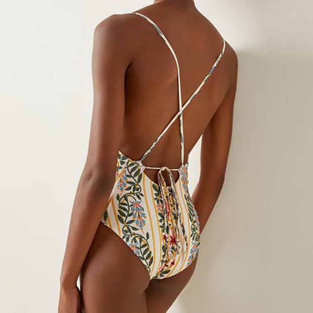 Women floral beachwear - stylish and vibrant swimsuits and cover-ups featuring floral patterns, perfect for a fashionable and feminine look at the beach.