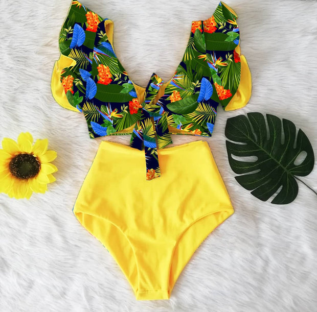 Sexy floral bikini set - a sultry and stylish two-piece ensemble featuring a bikini top and bottom adorned with vibrant floral patterns, perfect for a seductive beach look.