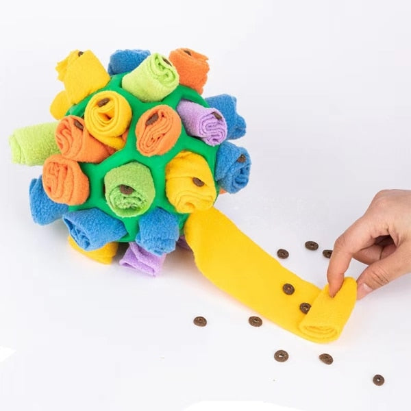 "Snuffle Ball: Engage your pet's senses with this interactive toy, perfect for sniffing and foraging fun."