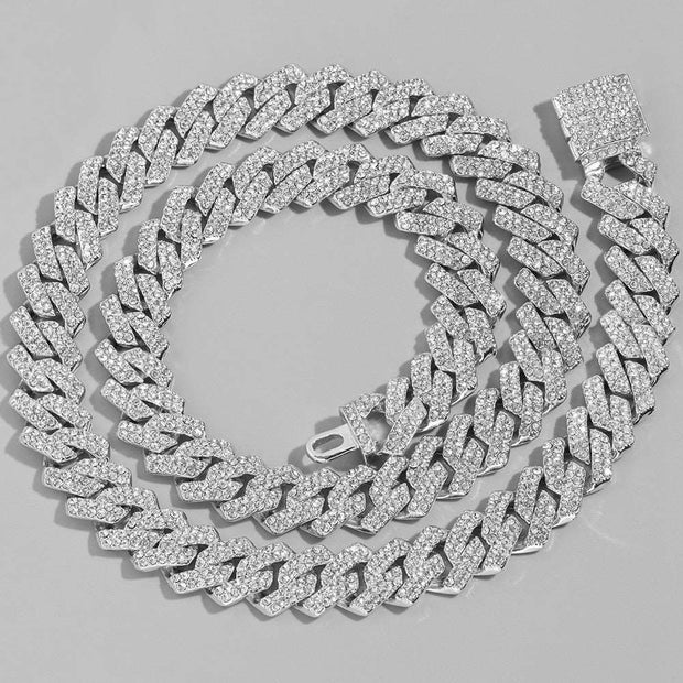 Bling rhinestone Cuban link necklace featuring dazzling rhinestones set in a bold Cuban link chain. Perfect for adding a touch of glamour and sparkle to any outfit, ideal for both casual and special occasions.
