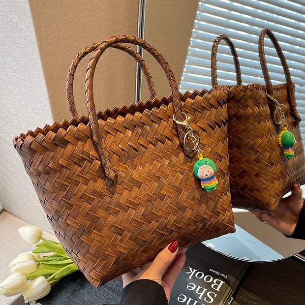 "Luxury weave straw tote bags: Exquisite craftsmanship meets beachside elegance. Elevate your summer style with these sophisticated yet relaxed accessories."
