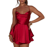 Backless cross tie romper - a chic and trendy romper featuring a backless design with cross tie detailing, perfect for a stylish and playful look.