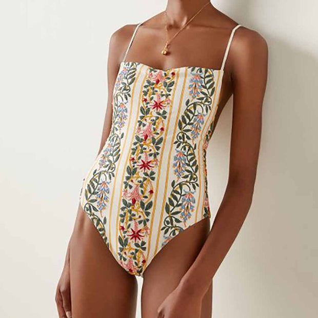 Women floral beachwear - stylish and vibrant swimsuits and cover-ups featuring floral patterns, perfect for a fashionable and feminine look at the beach.