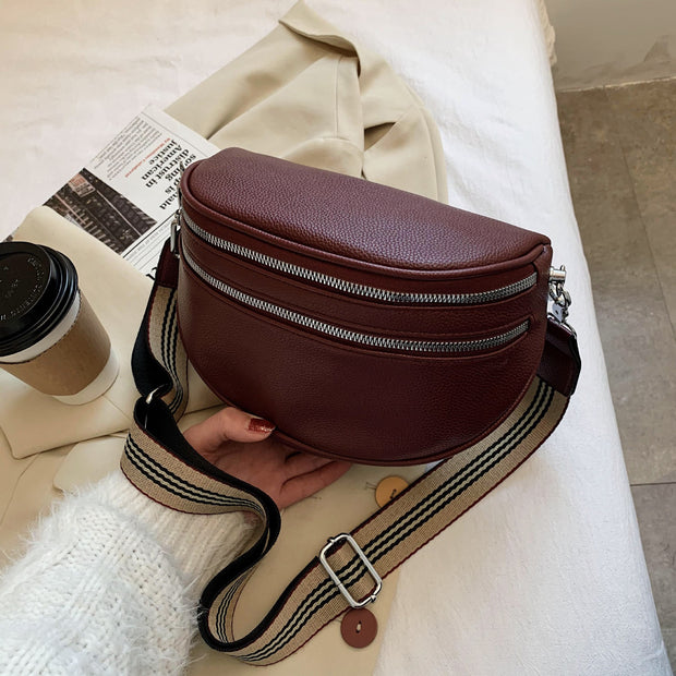 "Effortless crossbody bags: Streamlined style for on-the-go ease. Perfect for hands-free convenience without compromising on chic."