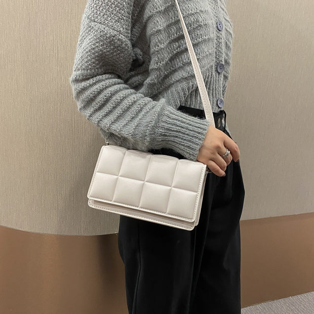 "Minority cross-body bag: Celebrate diversity in style. This chic accessory embraces uniqueness, making a bold fashion statement with every wear."