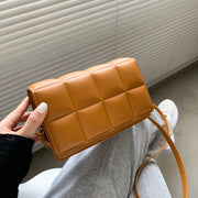 "Minority cross-body bag: Celebrate diversity in style. This chic accessory embraces uniqueness, making a bold fashion statement with every wear."