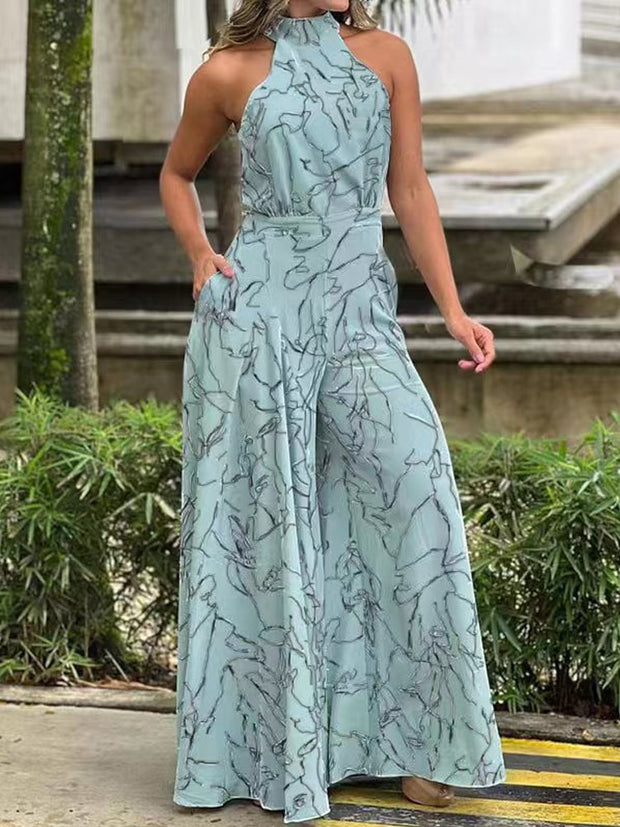 Elegant printed jumpsuits - sophisticated one-piece outfits featuring stylish printed patterns for a fashionable and refined look.