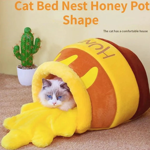 "Cozy honey jar cat bed, perfect for feline comfort and relaxation. Ideal for cat naps and lounging sessions."