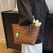 "Luxury weave straw tote bags: Exquisite craftsmanship meets beachside elegance. Elevate your summer style with these sophisticated yet relaxed accessories."