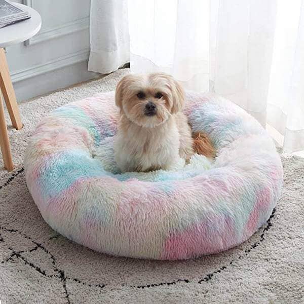 "Anti-Anxiety Calming Dog Bed: Provide comfort and relief to your furry friend with this soothing retreat designed to ease anxiety."