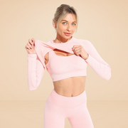 "Stylish women's workout clothes: leggings, sports bras, tank tops, and sneakers. Ideal for fitness and comfort during exercise routines."