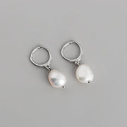 Pearl earrings featuring lustrous pearls set in a variety of elegant designs. Perfect for adding timeless elegance to any ensemble, these earrings are versatile and chic.