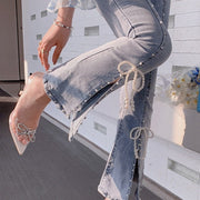 High Waist Split Denim Pants - Trendy and Edgy Design for Fashion Forward Looks. Elevate Your Style with Unique Split Detailing and Comfortable Fit.