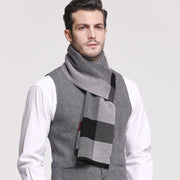 Men's warm plaid scarf, perfect for cold weather styling. Crafted from soft and cozy materials, this scarf features a classic plaid pattern, adding a touch of warmth and style to any outfit.