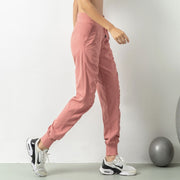 Women's athletic sweatpants featuring a comfortable fit, elastic waistband, and breathable fabric, ideal for workouts, lounging, or casual wear.