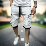 Men's cargo shorts, combining style and functionality for versatile wear. Featuring multiple pockets and a durable design, these shorts are perfect for outdoor adventures, casual outings, or everyday wear."