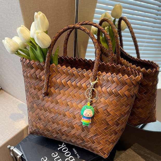 "Luxury weave straw tote bags: Exquisite craftsmanship meets beachside elegance. Elevate your summer style with these sophisticated yet relaxed accessories."