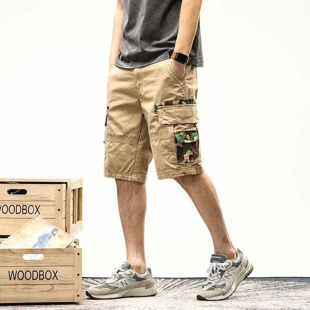 Camouflage cargo shorts, blending style and functionality for outdoor adventures. Featuring a camouflage pattern and multiple pockets, these shorts are perfect for hiking, camping, or casual wear.