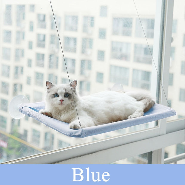 "Pet Cat Hanging Hammock: Treat your feline friend to the ultimate relaxation spot with this cozy and space-saving hammock."