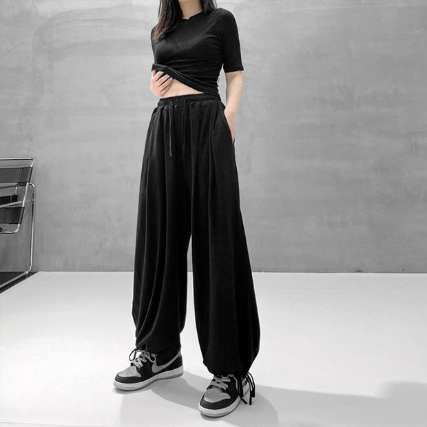 "High Waist Wide Leg Loose Trousers - Stylish and Comfortable Bottoms for Effortless Elegance. Elevate Your Look with Flattering Fit and On-Trend Design."