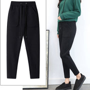 Women's warm harem pants, offering both comfort and style. Perfect for chilly days, featuring a relaxed fit and cozy fabric for ultimate warmth.