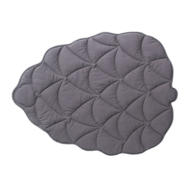 "Leaf Shape Puppy Bed: Provide your furry friend with a cozy and stylish sleeping space with this leaf-shaped pet bed."