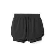 Crossfit 2-in-1 sport shorts, offering versatility and performance for intense workouts. Featuring a built-in compression liner and breathable outer layer, these shorts provide support and comfort for CrossFit training.