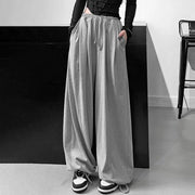"High Waist Wide Leg Loose Trousers - Stylish and Comfortable Bottoms for Effortless Elegance. Elevate Your Look with Flattering Fit and On-Trend Design."