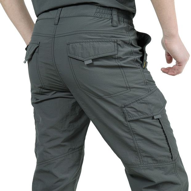 Men's lightweight tactical pants, combining durability and agility for outdoor activities. With a streamlined design and breathable fabric, these pants are ideal for hiking, camping, or tactical training.