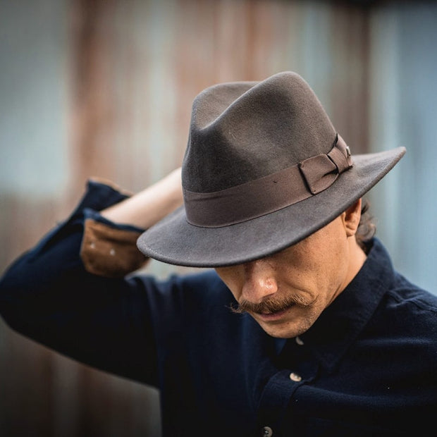 Men's woolen blend hat, offering warmth and style for the colder months. Crafted from a blend of wool and other materials, this hat provides both insulation and a sleek, fashionable look.