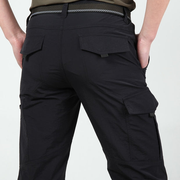 Men's lightweight tactical pants, combining durability and agility for outdoor activities. With a streamlined design and breathable fabric, these pants are ideal for hiking, camping, or tactical training.