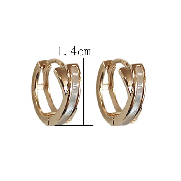 Classic hoop earrings crafted from genuine 14K gold, featuring a timeless and elegant design. Perfect for adding a touch of sophistication to any look, these earrings are a versatile accessory.