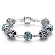 Crystal bead charm bracelet featuring sparkling beads and delicate charms, perfect for adding a touch of elegance and sparkle to any outfit. Ideal for both casual and formal occasions.
